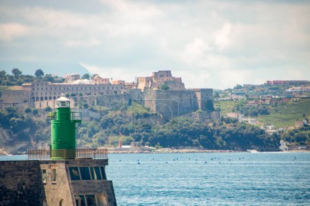 Photo for Landscape of the coastline and aragon castle as seen from the harbor of Pozzuoli, Naples, Campania, Italy - Royalty Free Image