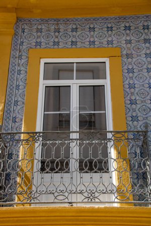 Photo for At Aveiro, Portugal, On 30-08-2023- beautiful window  of an historic building in Aveiro , decorated with azulejos tiles - Royalty Free Image