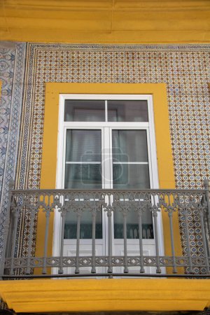 Photo for At Aveiro, Portugal, On 30-08-2023- beautiful window  of an historic building in Aveiro , decorated with azulejos tiles - Royalty Free Image