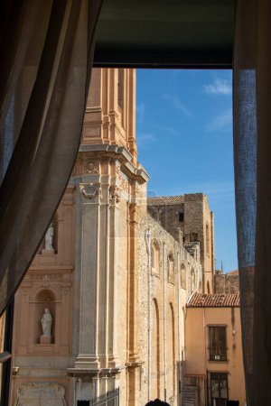the facade of  cathedral of San Nicola  at Termini Imerese seen from a window, in Palermo province, Sicily, Italy