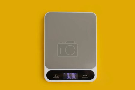 Photo for Electronic kitchen scales on a colored background - Royalty Free Image