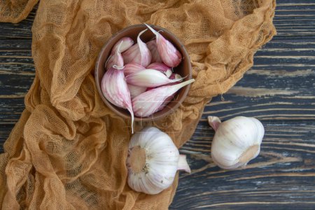 Photo for Fresh garlic on old background - Royalty Free Image