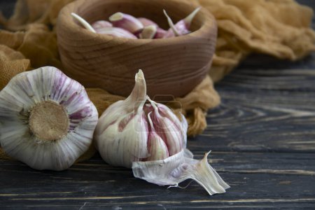 Photo for Fresh garlic on old background - Royalty Free Image