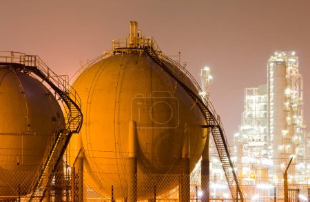 Photo for A large oil-refinery plant with Liquefied Natural Gas - LNG - storage tanks - Royalty Free Image