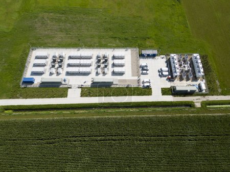 Aerial view of batteries for energy storage supplying and stabilizing a larger amount of renewable energy to the electric grid, Flevopolder, The Netherlands