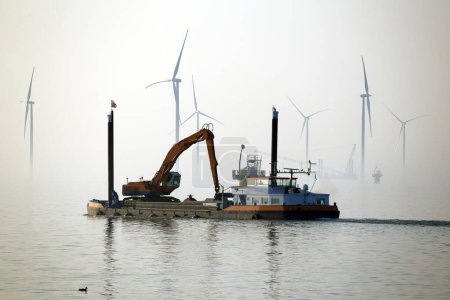 A transport ship for constructing an offshore windpark, Ijsselmeer, The Netherlands