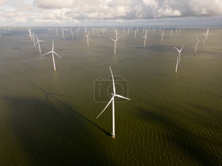 Photo for Windturbines in an offshore windpark, Ijsselmeer, Breezanddijk, The Netherlands - Royalty Free Image