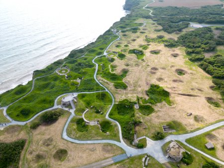 Aerial view of bunkers and bomb craters at pointe du Hoc, France