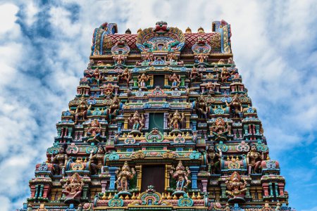 Photo for Hindu temple ri Maha Mariamman Temple ("Wat Phra Si Maha Umathewi") on Si Lom Road in Bangkok, Thailand. Built in 1879. Brightly colored decorations and statues on the exterior. - Royalty Free Image