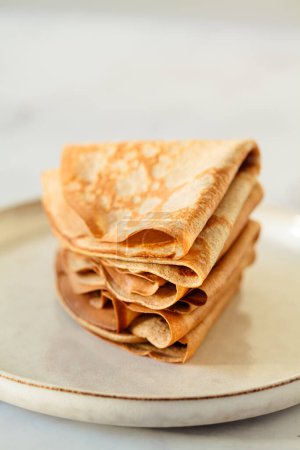 Traditional Russian sweet thin crepes, close-up.