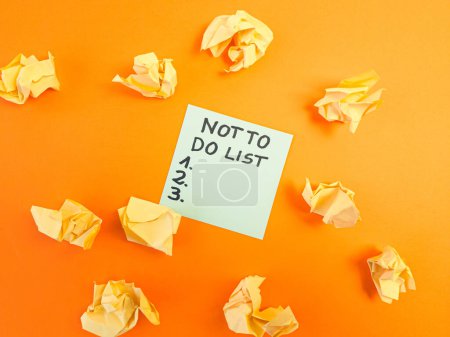 Photo for Not to do list handwritten on sticky note in office. Planning, strategy, business management, balance concept - Royalty Free Image