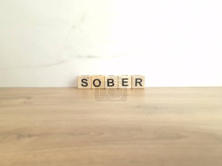 Photo for Word sober made from wooden blocks. Quitting alcohol addiction concept - Royalty Free Image
