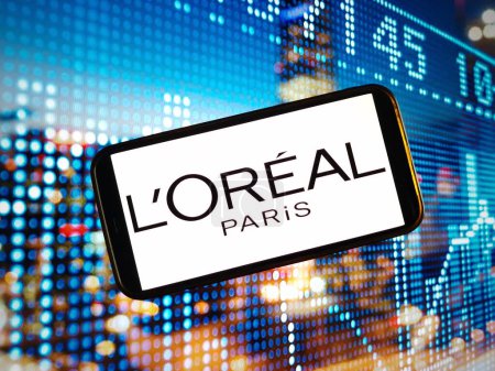 Photo for Konskie, Poland - January 04, 2024: L`Oreal company logo displayed on mobile phone screen - Royalty Free Image