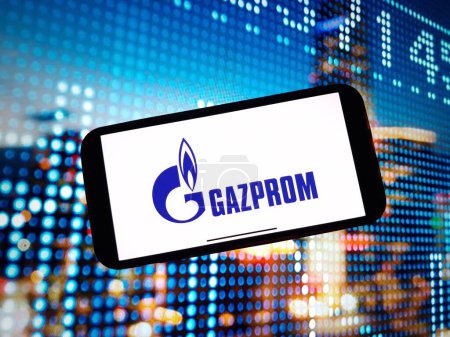 Photo for Konskie, Poland - January 07, 2024: Gazprom company logo displayed on mobile phone screen - Royalty Free Image