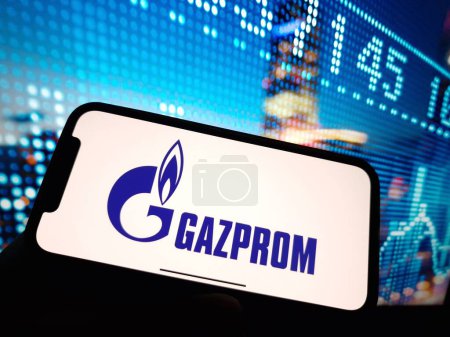 Photo for Konskie, Poland - January 07, 2024: Gazprom company logo displayed on mobile phone screen - Royalty Free Image