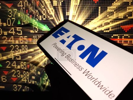 Photo for Konskie, Poland - January 13, 2024: Eaton Corporation plc company logo displayed on mobile phone screen - Royalty Free Image