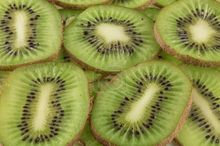 kiwi fruit cut into slices. Front view.