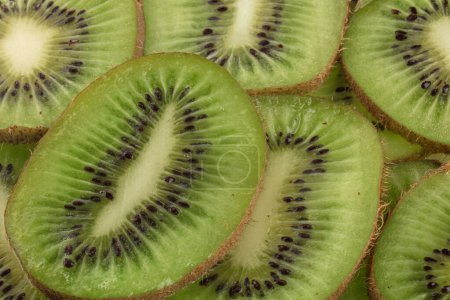 kiwi fruit cut into slices. Front view.
