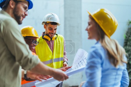 Photo for Diverse team of experts planning on the construction site. Real estate project with civil engineers and architects - Royalty Free Image