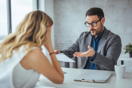 Photo for Angry businessman arguing with businesswoman about paperwork failure at workplace, executives having conflict over responsibility for bad work results, partners disputing about contract during meeting - Royalty Free Image