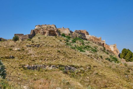 Photo for Ancient stone fortress of Sagunto Castle on the top of mountain. Spain. - Royalty Free Image