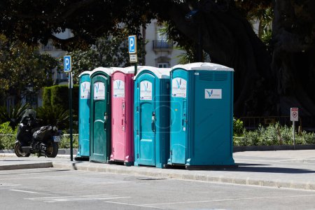 Photo for Temporary public toilets installed in the city center during the Las Fallas festival. Valencia, Spain - March 03, 2024. - Royalty Free Image
