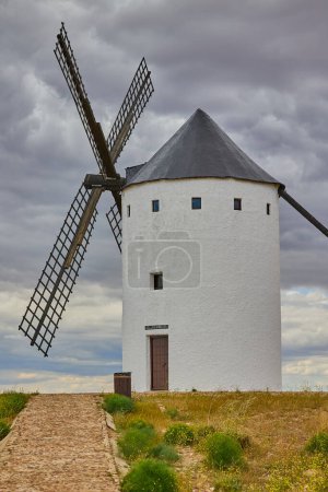 Old windmill in top of the hill in Spain. Land of the Giants and Don Quixote stories.