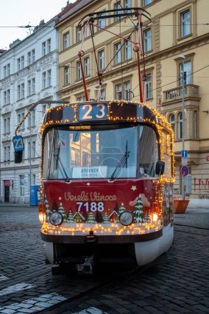 Photo for Tatra T3 tram decorated for Christmas. The T3 is a type of Czech tramcar produced by KD Tatra. During its period of production between 1960 and 1999, 13,991 powered units and 122 unpowered trailers were sold worldwide. - Royalty Free Image