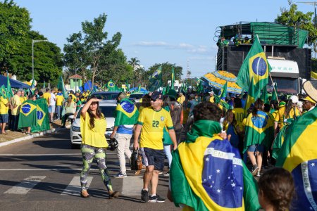 Photo for Campo Grande, MS, Brazil - November 06, 2022: brazilian protesters on the streets asking for federal intervention after Lula election. Duque de Caxias avenue, in front of CMO, military area. - Royalty Free Image