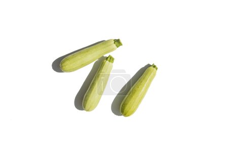 Photo for Fresh zucchini on a white background. Top view, flat lay. - Royalty Free Image