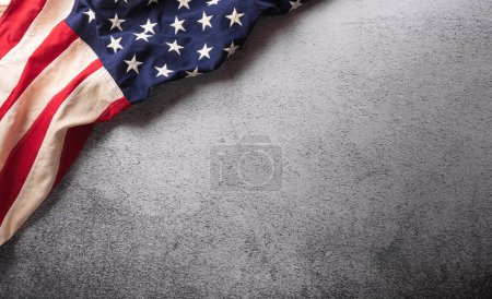 Photo for Happy Veterans day concept made from American flag on dark stone background. - Royalty Free Image