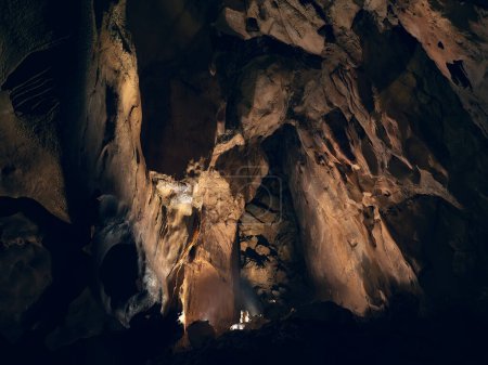 Photo for Inside underground Prometheus Cave, also known as Kumistavi Cave, Tskhaltubo Cave or Tskhaltubo Gliana Cave, western Georgia. Stalactites stalagmites and ancient stone formations. - Royalty Free Image