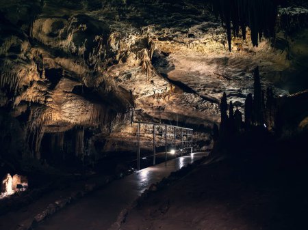 Photo for Inside underground Prometheus Cave, also known as Kumistavi Cave, Tskhaltubo Cave or Tskhaltubo Gliana Cave, western Georgia. Stalactites stalagmites and ancient stone formations. - Royalty Free Image