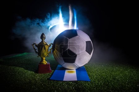 Photo for Soccer 2022. Grand Final Argentina vs France theme. Soccer ball on green grass. Support your country or cheer concept. Selective focus - Royalty Free Image