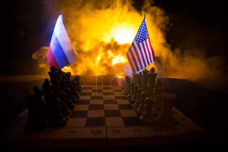 Photo for War between Russia and Ukraine, conceptual image of war using chess board, soldiers and national flags on the background of explosion. Ukrainian and Russian crisis. Selective focus - Royalty Free Image