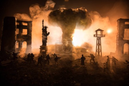 Téléchargez les photos : Conceptual image of war between Democracy and dictatorship using toy soldiers. Battle in ruined city. Selective focus - en image libre de droit