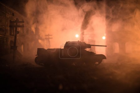 Photo for War Concept. Military silhouettes fighting scene on war fog sky background, World War Soldiers Silhouette Below Cloudy Skyline At night. Battle in ruined city. Selective focus - Royalty Free Image