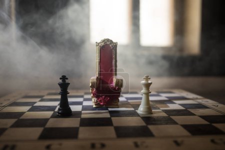 Photo for Red royal chair (Medieval Throne) miniature on chessboard. . Chess board game concept of business ideas and competition and strategy ideas concept. Selective focus - Royalty Free Image