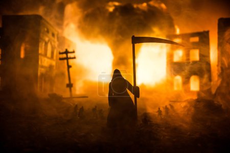 Foto de Concept of death soldiers during the war. Grim reaper (Skeleton) holding schyte with military fighting silhouettes in destroyed city. Selective focus - Imagen libre de derechos