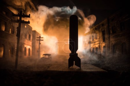 Photo for Nuclear war apocalypse concept. Explosion of nuclear bomb in city. City destroyed by atomic war. Creative artwork decoration in dark. Selective focus - Royalty Free Image