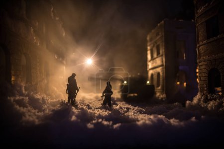 Téléchargez les photos : War apocalypse concept. Snow covered ruined city destroyed by war. Creative artwork decoration in dark. Selective focus - en image libre de droit