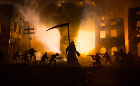 Téléchargez les photos : Concept of death soldiers during the war. Grim reaper (Skeleton) holding schyte with military fighting silhouettes in destroyed city. Selective focus - en image libre de droit