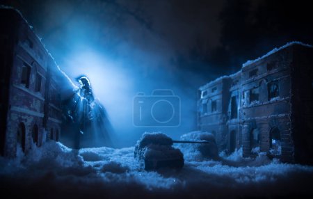 Téléchargez les photos : War apocalypse concept. Snow covered ruined city destroyed by war. Creative artwork decoration in dark. Selective focus - en image libre de droit