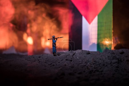 Photo for Conflict between Israel and Palestine concept. Burning and destroyed city by war. Concept of crisis of war creative decoration. Selective focus - Royalty Free Image