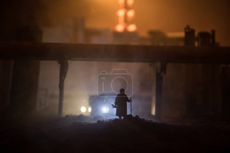 Photo for Creative artwork decoration. Chernobyl nuclear power plant at night. Layout of abandoned Chernobyl station after nuclear reactor explosion. Selective focus - Royalty Free Image