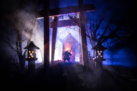 Photo for Creative artwork decoration. Abstract Japanese style wooden tunnel at night. Night scene in fantasy forest. Selective focus - Royalty Free Image
