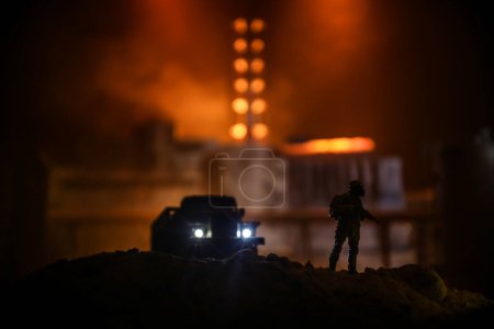 Creative artwork decoration. Chernobyl nuclear power plant at night. Layout of abandoned Chernobyl station after nuclear reactor explosion. Selective focus