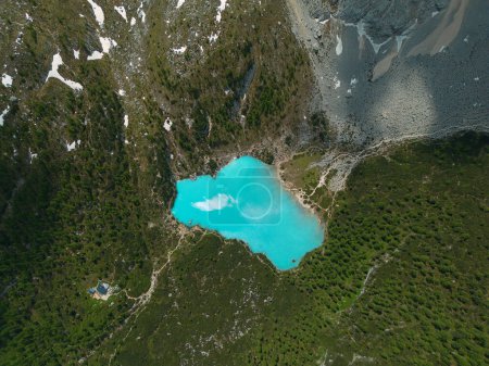 Photo for Aerial view, stunning panoramic view of the Lake Sorapis, Lago di Sorapis, with turquoise water surrounded by green forest and huge rocky mountains. Dolomites, Italy. - Royalty Free Image