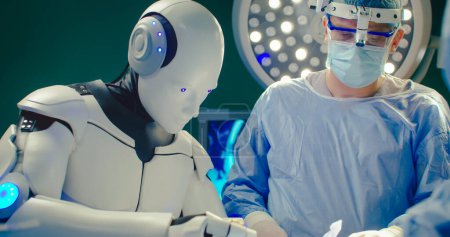 Foto de Futuro concepto de cirugía robótica. Sala de cirugía en el hospital con equipo de tecnología robótica. Cirujano robot en quirófano futurista. Innovación quirúrgica mínimamente invasiva. - Imagen libre de derechos