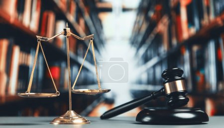 Photo for Shiny golden balanced scale and wooden gavel in court library background as symbol of justice and legal authority concept reflecting equality and fair judgment by lawyer and judge. equility - Royalty Free Image